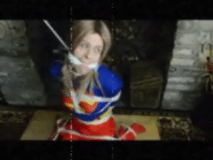www.naughtynina.net - Supergirl Bound and gagged thumbnail